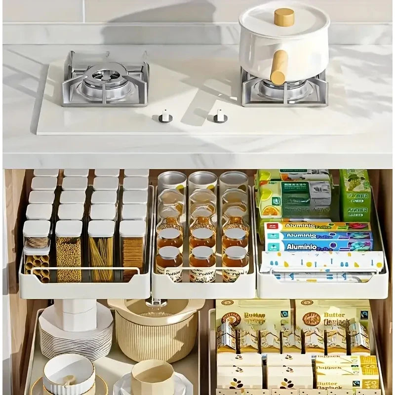 New kitchen storage rack featuring slide rails and a pull-out drawer design, perfect for organizing trays, spice boxes, and shelves inside cabinets.