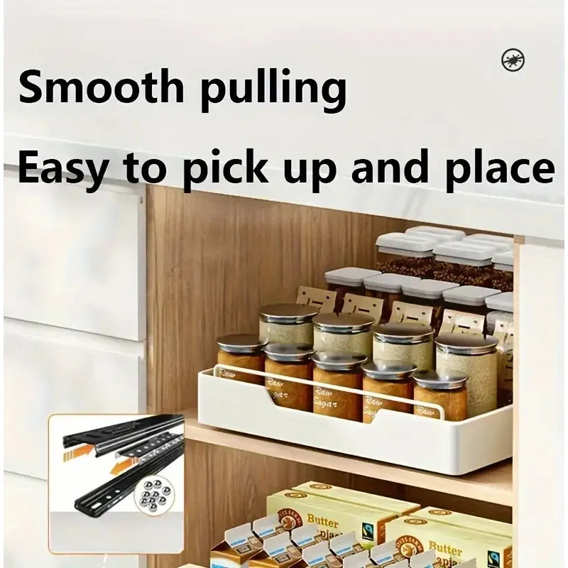 New kitchen storage rack featuring slide rails and a pull-out drawer design, perfect for organizing trays, spice boxes, and shelves inside cabinets.